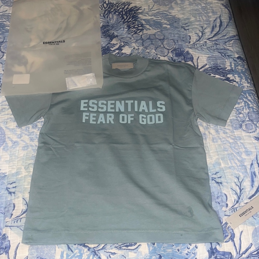 Brand new kids size 12 Essentials T shirt